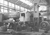 View inside Tyseley factory showing various GWR 2-6-2T 'Prairie class locomotives under going repair