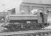 GWR 0-6-0PT No 9750, a class 57xx full-cab locomotive, is seen in steam in front of Tyseley's two-road coaling shed