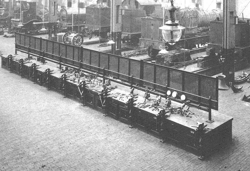 Close up showing the fitter's workbench complete with screen which could accommodate up to nine workmen using vices and other tools