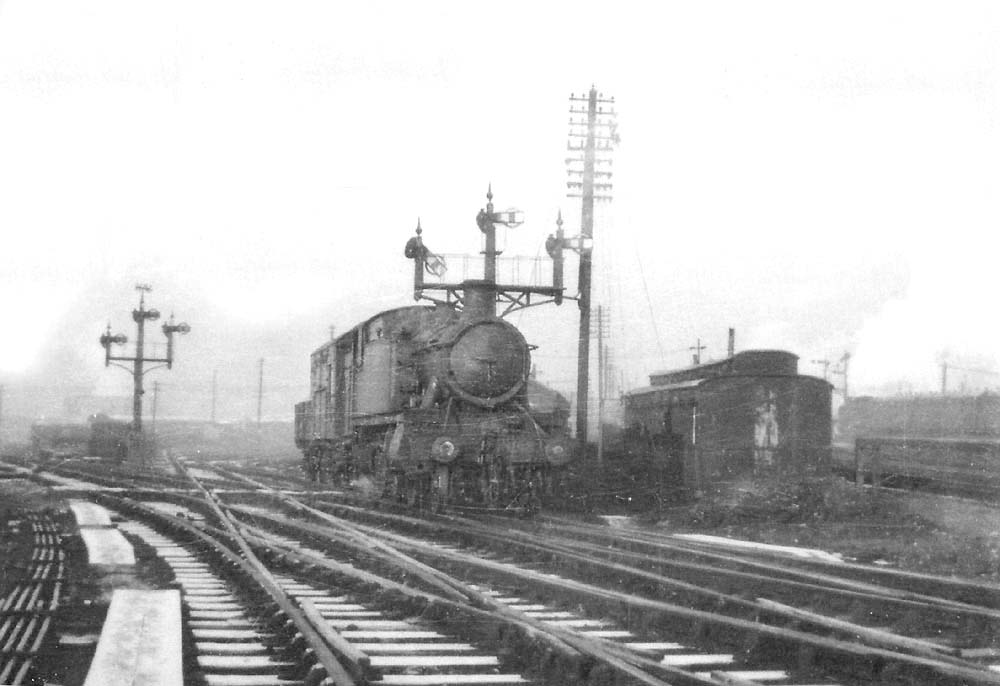 View of an unidentified ex-GWR 2-6-2T 'Prairie' locomotive which has been given the road to proceed towards joining the main line at Tyseley station
