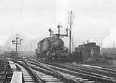 View of an unidentified ex-GWR 2-6-2T 'Prairie' locomotive which has been given the road to proceed towards joining the main line at Tyseley station