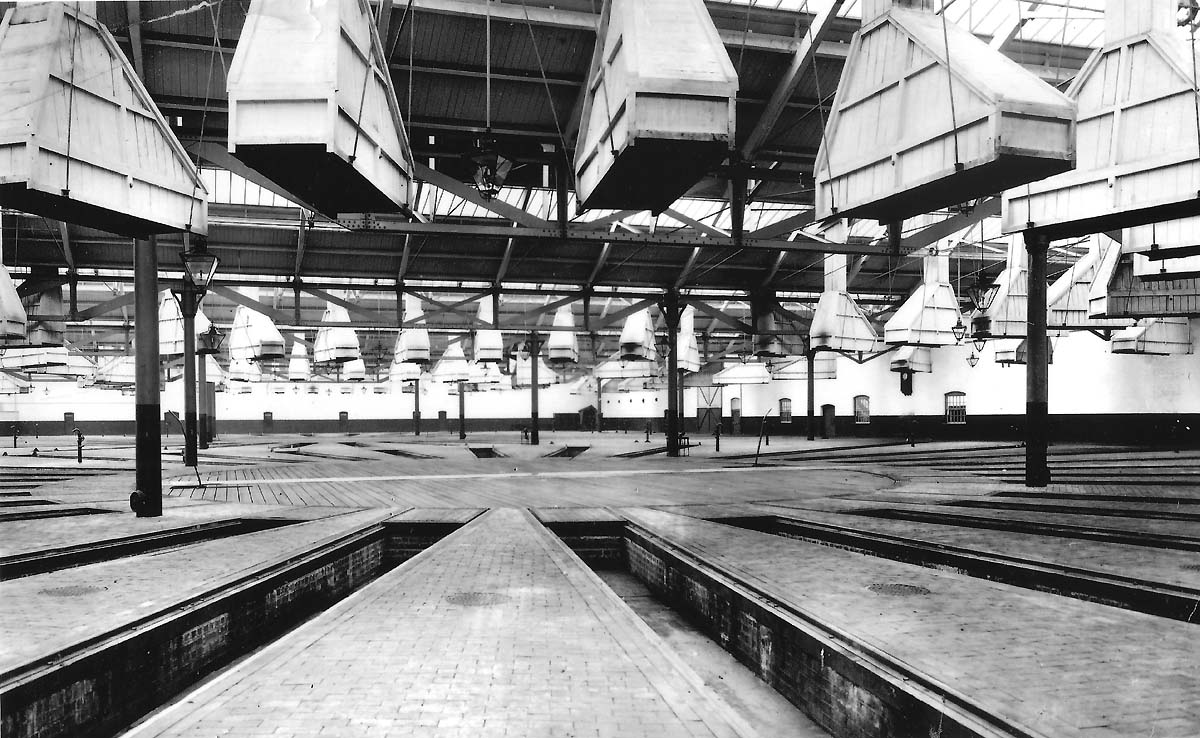 View of the inside of Tyseley roundhouse showing the two sets of boarded turntables prior to the shed being opened in 1908