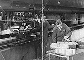 An internal view of Tyseley shed showing fitters Gerald Clapham and Alan Hughes at work in July 1958