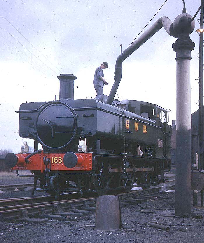 British Railways built 0-6-0PT 16xx Class No 1638, now preserved, is seen in steam in GWR livery on 18th March 1967