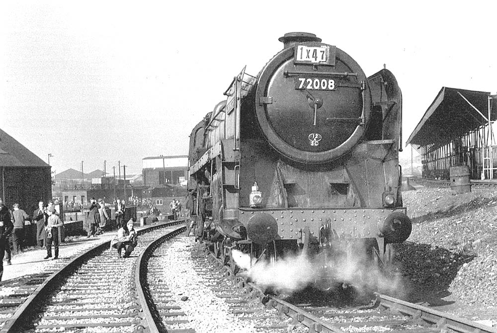British Railways Standard Class 6 4-6-2 No 72008 'Clan MacLeod', on a rare visit, is seen at Tyseley on 26th March 1963