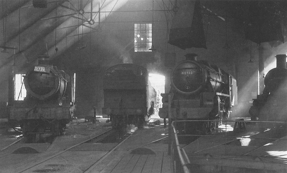 Ex-GWR 4-6-0 No 6831 Bearley Grange and ex-LMS 4-6-0 Class 5MT No 44932 inside Tyseley shed on 19th September 1965