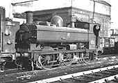Ex-GWR 0-6-0PT 57xx Class No 8700 is seen standing on shed and still retaining its GWR button logo