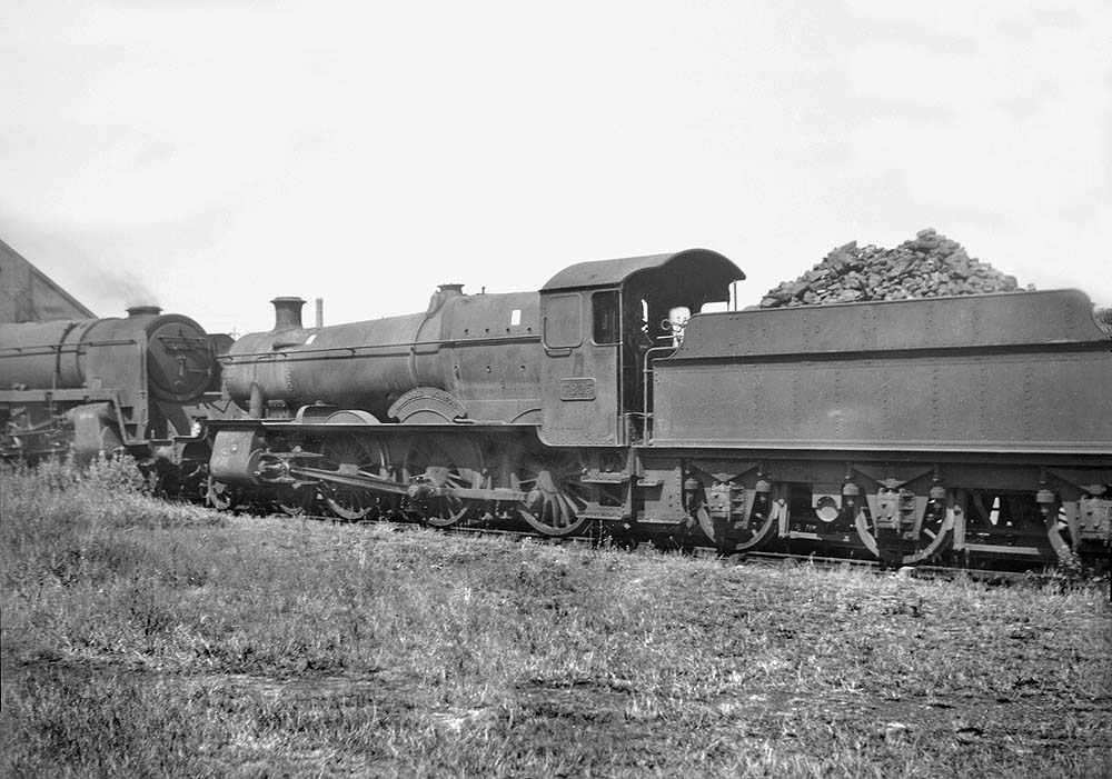 Grimy ex-GWR 4-6-0 78xx Class No 7805 'Broome Manor' is seen stabled at the rear of Tyseley shed