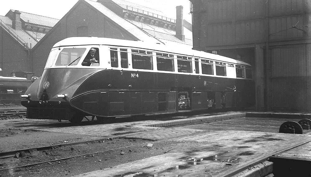 GWR Railcar No 4 is seen standing outside on one of the entrance roads of Tyseley shed in 1934
