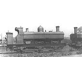 GWR 0-6-0PT No 1070 fitted with a half-cab and a member of the outside-framed 1016 class, is seen on shed on 21st June 1931