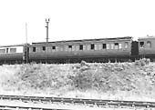 A 53 foot long corridor third class clerestory coach, No 2836, on the bank at Tyseley in July 1947