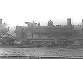 GWR 0-6-0PT No 1955, a half-cab class 850 locomotive, is seen standing in line outside Tyseley shed circa 1932