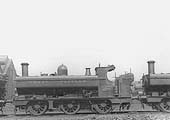 GWR 0-6-0PT No 2036, a member of the 2021 class fitted with a half-cab, is seen standing in line outside Tyseley's roundhouses