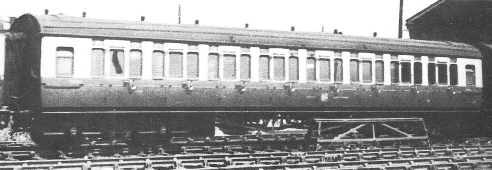 Fifty-six foot, eleven inch long third class corridor toplight coach No 3892 in the final GWR livery at Tyseley Carriage Sidings