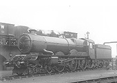 GWR 4-6-0 King class No 6006 'King George I' is seen on Tyseley shed's coaling roads as it takes on water