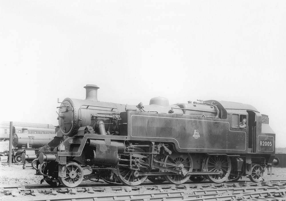 British Railways 3MT 2-6-2T No 82005, a 82000 standard class locomotive, stands in one of Tyseley shed's stabling roads