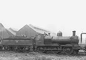 GWR 0-6-0 No 2477, a 2301 class locomotive, is seen outside Tyseley's roundhouses with the Repair Shops in the background