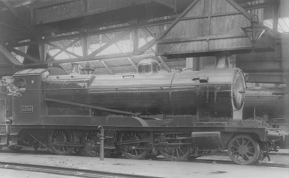 In gleaming and pristine condition ex-ROD 2-8-0 No 3008 is seen standing full coaled inside Tyseley shed in August 1932