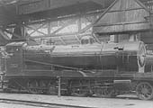 In gleaming and pristine condition ex-ROD 2-8-0 No 3008 is seen standing full coaled inside Tyseley shed in August 1932