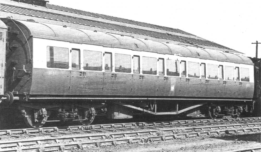 Ex-GWR sixty-one foot long, bow-ended, third class, corridor coach No 5264 in the sidings alongside the Tyseley Carriage Shed in May 1948