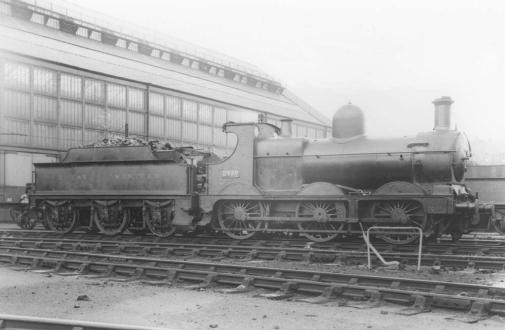 GWR 0-6-0 No 2439, a member of the 2301 class better known as a Dean Goods, stands on one of the stabling roads outside the shed