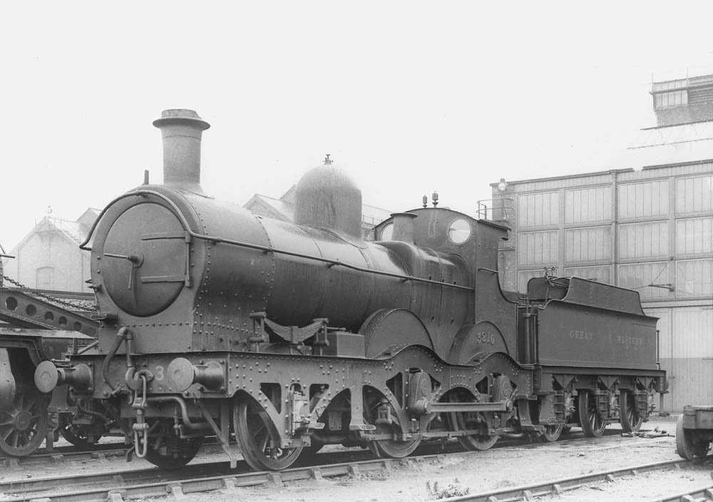 GWR 2-4-0 Barnum class No 3210, a curved outside-framed locomotive, stands outside Tyseley's Repair shops on 19th March 1933