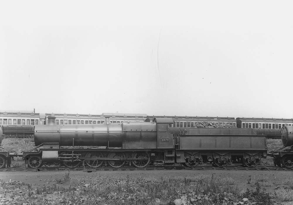 GWR 2-8-0 No 2874, a 28xx class locomotive, stands on one of Tyseley shed's stabling roads with the carriage sidings in the background