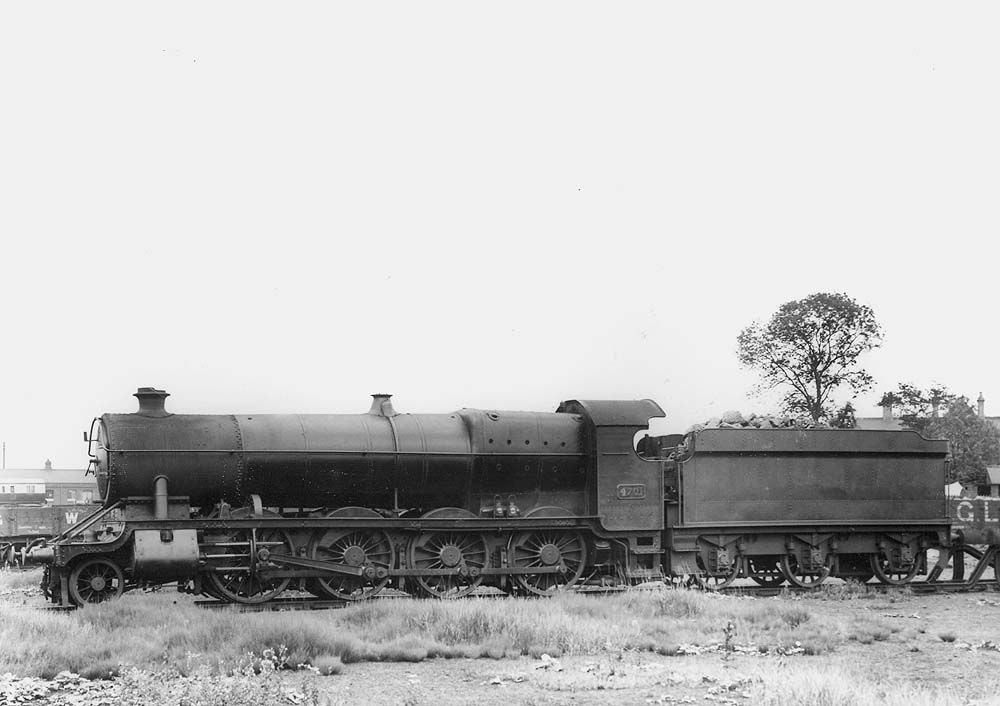 GWR 2-8-0 No 4701, the first locomotive of the 4701 class, is seen with its tender buffered up against the stops at Tyseley shed