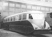 GWR Railcar No 2 is seen with its side panel removed to provide access to the engine as it stands in front of Tyseley's Repair Shops