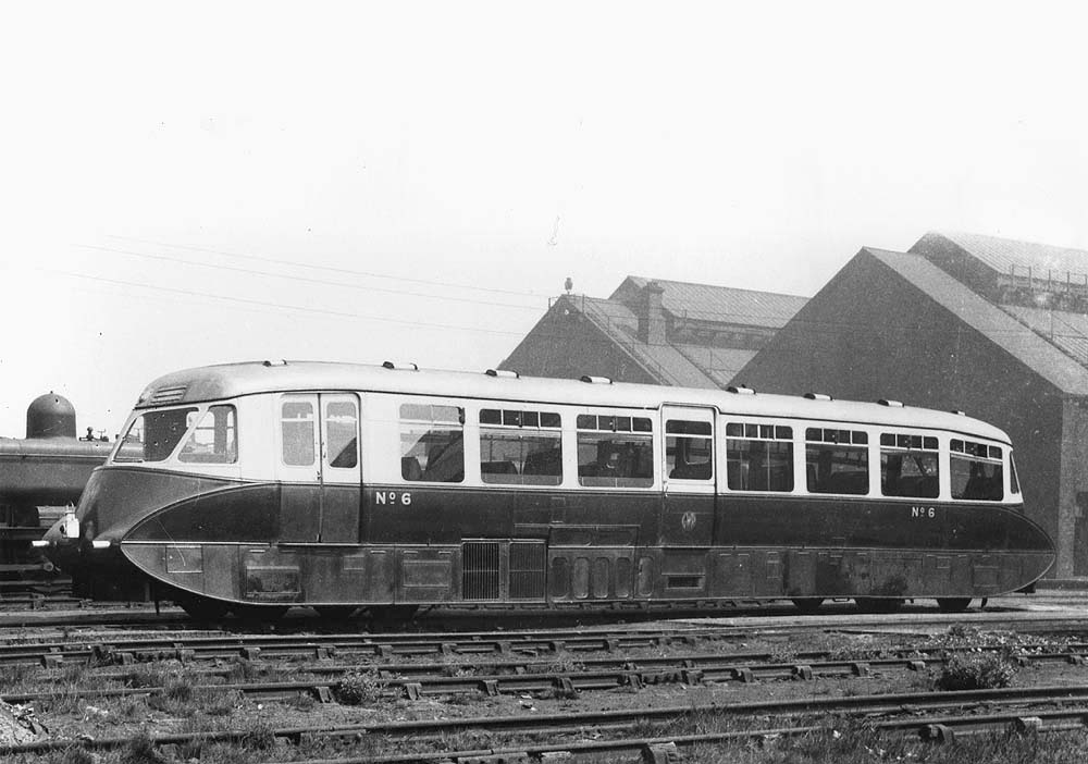 GWR Railcar No 6, a member of the second production batch, stands in front of Tyseley shed next to an unknown GWR 0-6-0PT Pannier tank