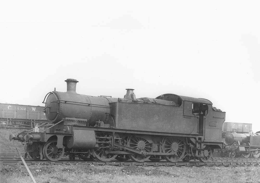 GWR 2-6-2T No 5140, a class 51xx 'Large Prairie' locomotive, is seen on one of Tyseley shed's stabling roads with the coaling stage in the background