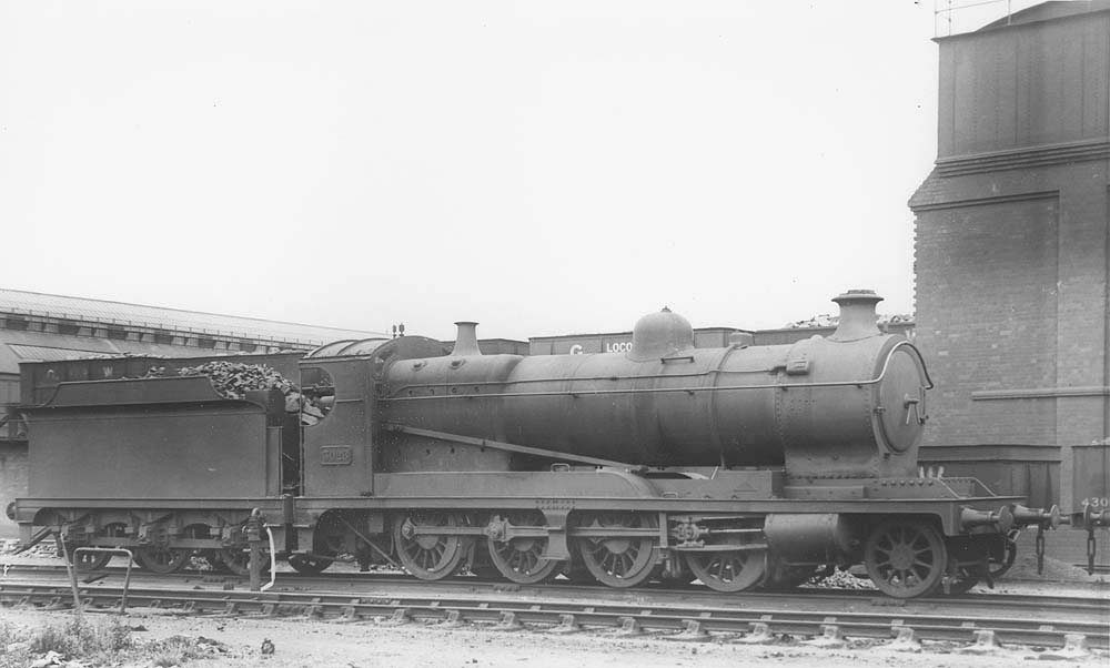 Ex-ROD 2-8-0 No 3026 is seen standing alongside Tyseley shed's two-road coaling stage fully coaled and ready for its next turn of duties