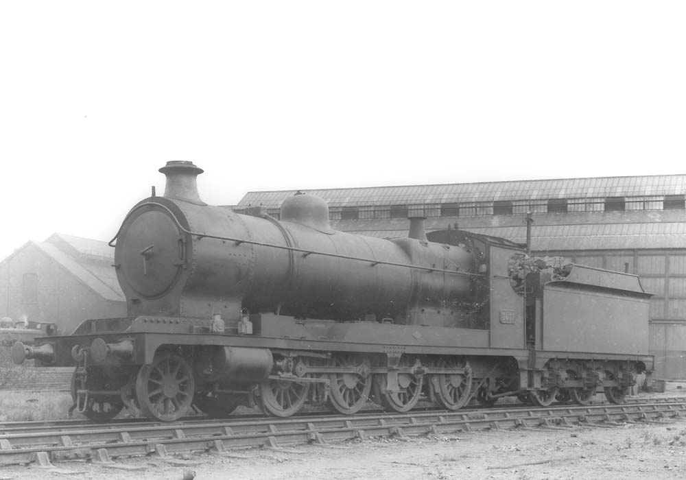 A later view of ex-ROD 2-8-0 No 3037 now seen standing on one of the approach roads to Tyseley's Repair workshops