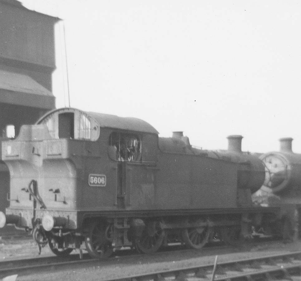 Ex-GWR 56xx class 0-6-2T No 5606 stands 'cold' in front of Tyseley shed on a Sunday in the early 1960s