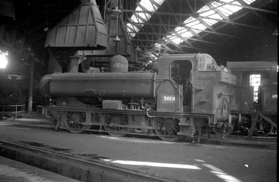 Ex-Great Western Railway 0-6-0PT (57xx class) Pannier Tank No 3619 sits in Tyseley Locomotive Shed in the mid 1960s