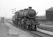 Ivatt 2-6-0 4MT No 43112 is seen running light engine past Tyesley carriage sidings and shed on 15th February 1965