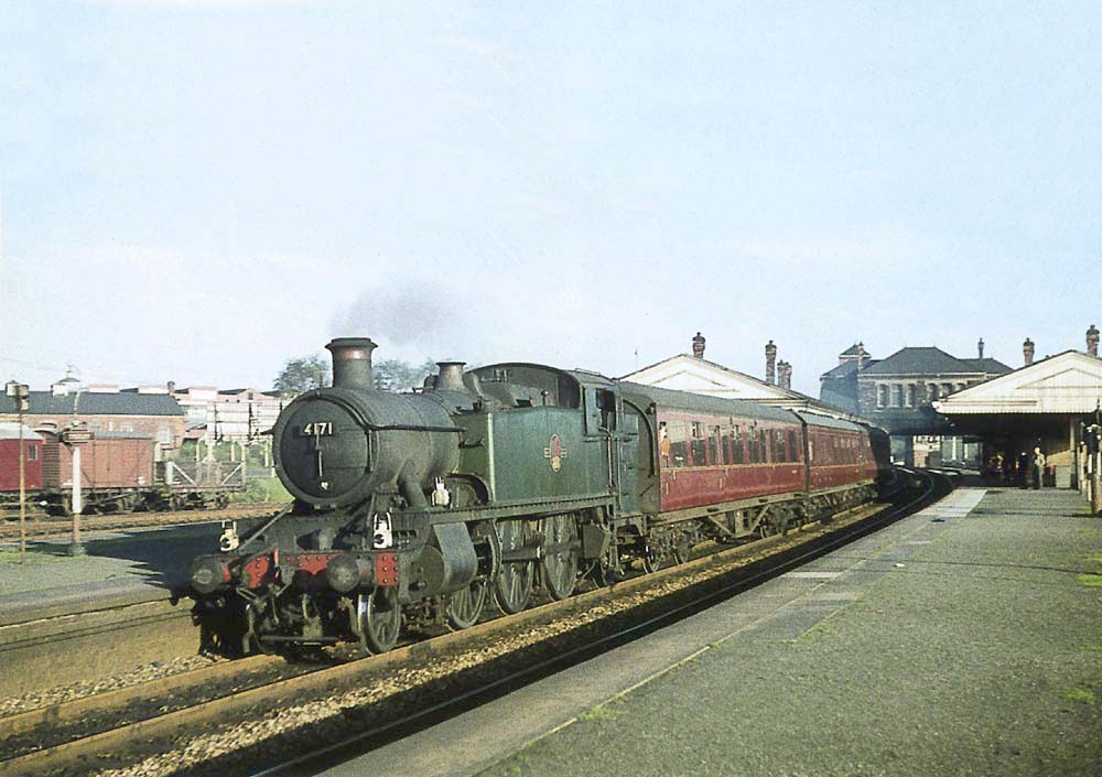 Ex-GWR 2-6-2T Prairie No 4171 is passing through the down main running line whilst at the head of the 3.30pm Oxford to Snow Hill express passenger service