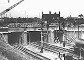 Looking across the railway to Stockfield Road bridge as construction work on the bridge enters the final phase of completing walls and road surfaces