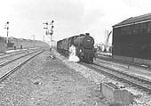 Western class diesel-hydraulic locomotives No D1072 is seen at the head of the 09 10 am Birmingham to Paddington express on 15th Feb 1965