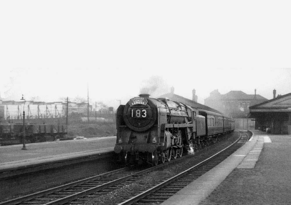British Railways 4-6-2 Britannia Class No 70018 'Flying Dutchman' passes through Tyseley at speed on a down express to Snow Hill on 30th October 1954.