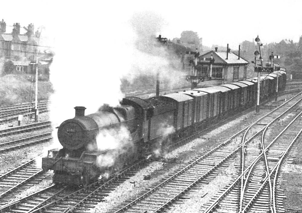 Ex-GWR 4-6-0 68xx Class No 6840 passes Tyseley Junction Signal Box on the down relief line in the early 1960s