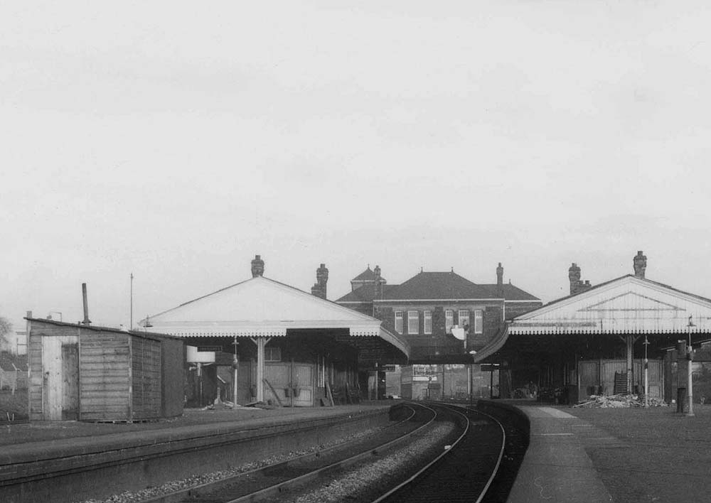 Close up of Tyseley station's platform based passenger facilities, with the relief line passenger structure in the process of being demolished
