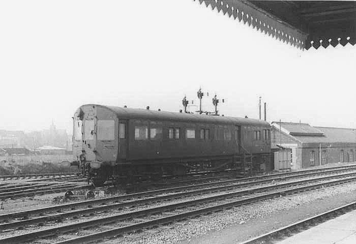 An ex-GWR Autocoach now being used as mess facilities is seen standing in the siding opposite platform 4, the down relief platform