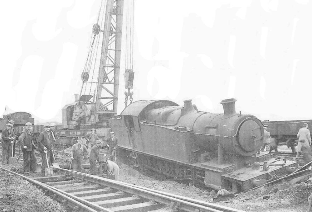 View of GWR 2-8-2T No 7238 after running in to a Luftwaffe bomb crater at Budbrook near Hatton on 17th May 1941