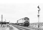 A British Railways Sulzer Type 4 Bo-Bo diesel locomotive is seen on an up permanent way train in September 1966