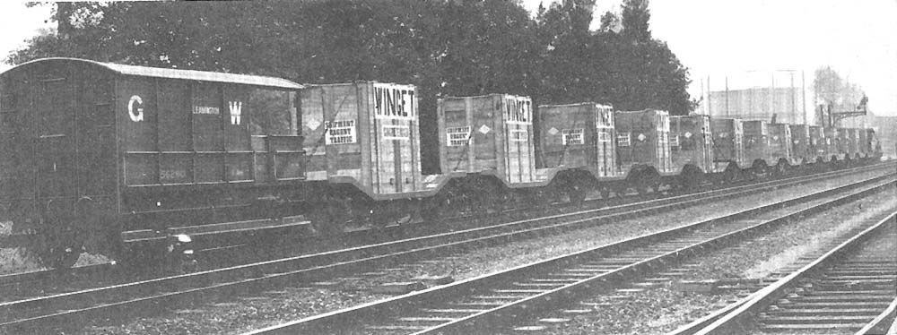 An official photograph for the Great Western Railway Magazine (October 1928) showing a large consignment of crated Winget concrete mixing machines leaving Warwick