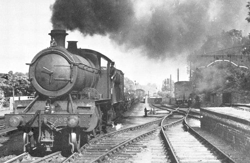 GWR 2-6-0 Mogul No 5399 is seen working hard to build up speed ready to tackle Hatton Bank whilst on an express freight working