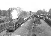 Ex-GWR 4-6-0 King class No 6014 'King Henry VII' is seen with plenty of steam as it starts to tackle Hatton Bank with a down express