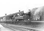 Ex-GWR 0-6-0PT 55xx class Pannier Tank No 9740 is seen shunting wagons in to the goods yard from the mainline between paths