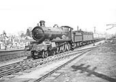 GWR 4-6-0 29xx Class No 2914 'Saint Augustine' is seen at the head of a down express service to Snow Hill